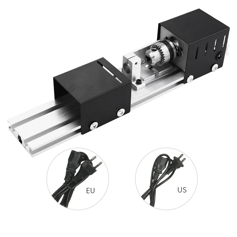 Mini silver metal woodworking lathe with carving knives on wooden surface