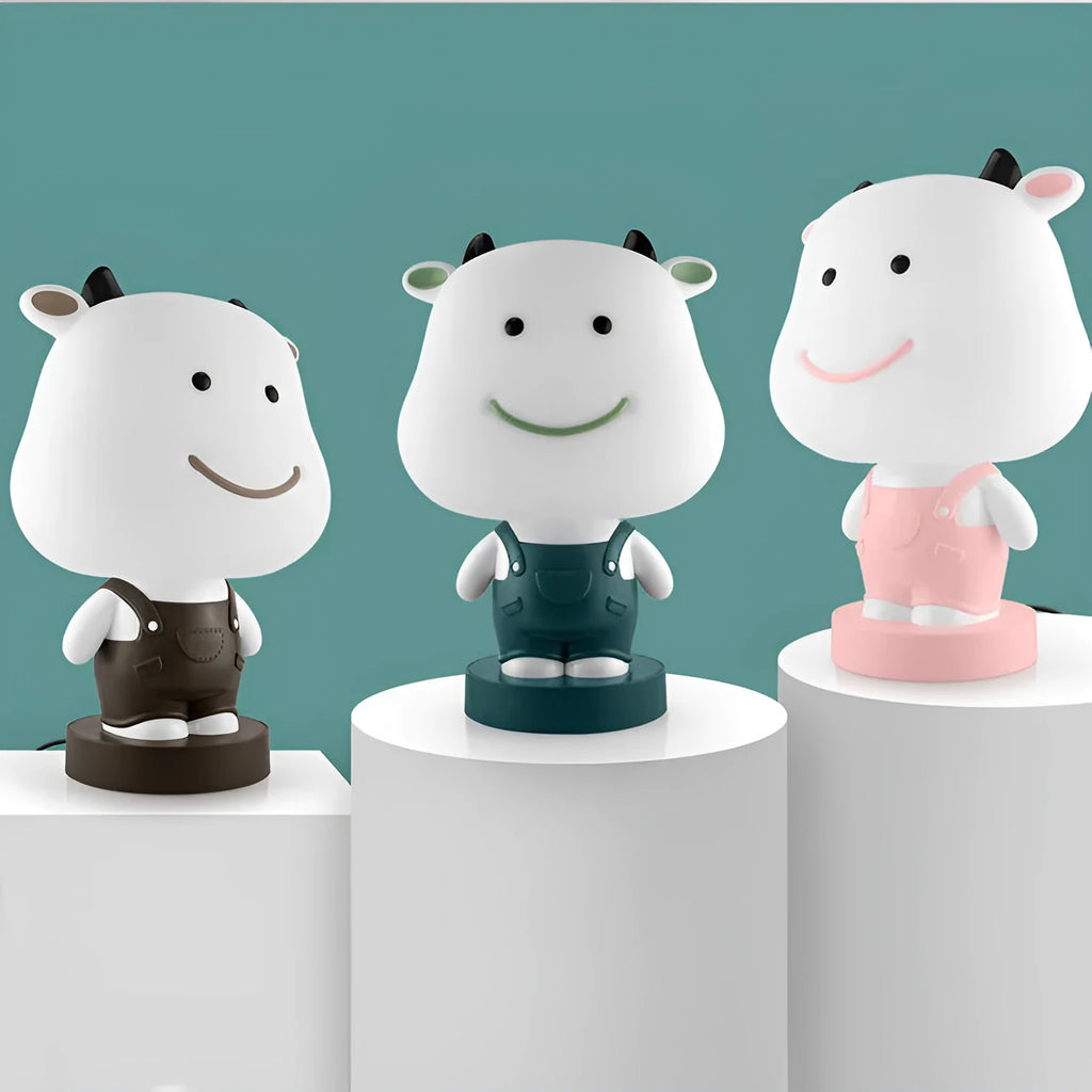 Cartoon animal table lamp in bear, cattle, rabbit, or tiger design with plastic shade and LED light