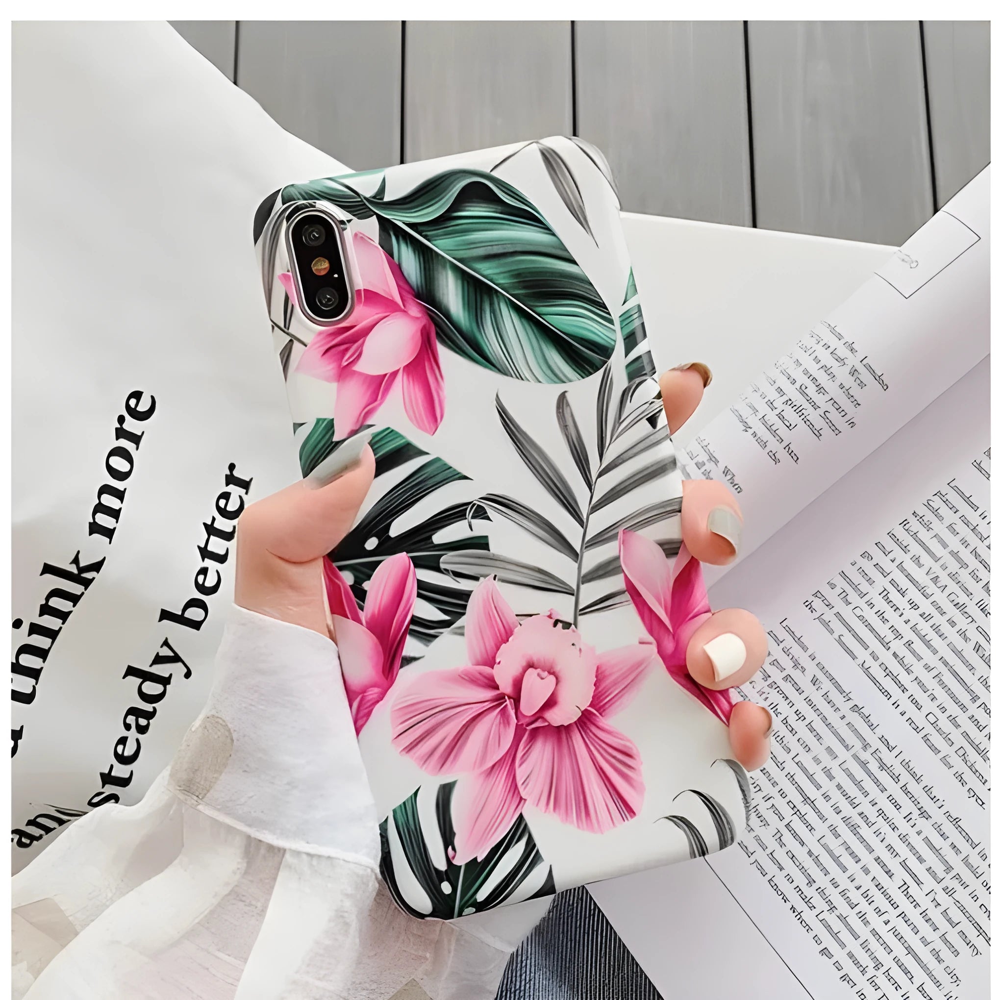 Pink floral pattern TPU iPhone case showing flower design on back cover for multiple iPhone models