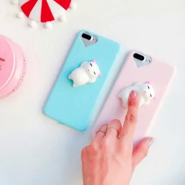 Soft black silicone iPhone case with a raised 3D cartoon cat design