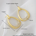 Yellow gold coloured geometric drop earrings for women, showing oval ring design.