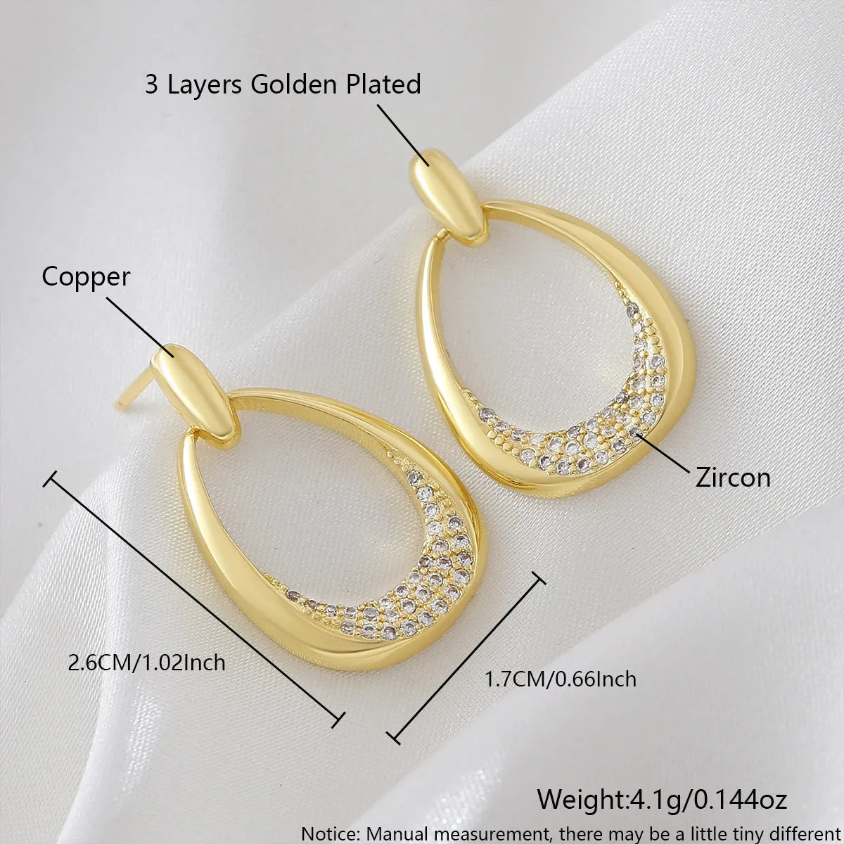 Yellow gold coloured geometric drop earrings for women, showing oval ring design.