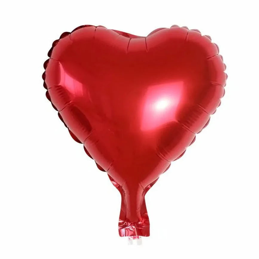 Five aluminium foil peach heart balloons in metallic colours arranged together