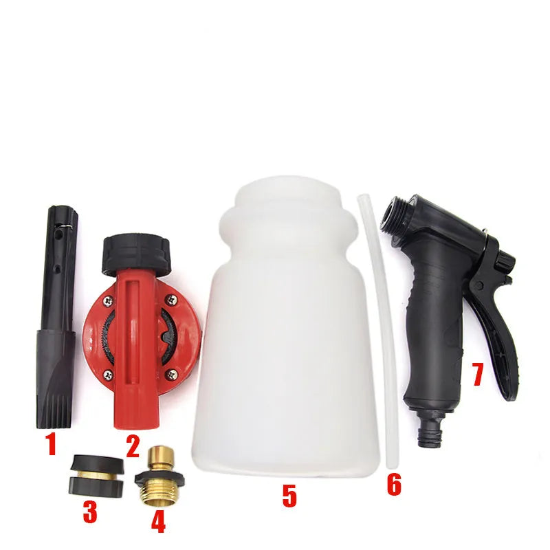Blue handheld foam pot high pressure water gun for garden spraying on a garden table