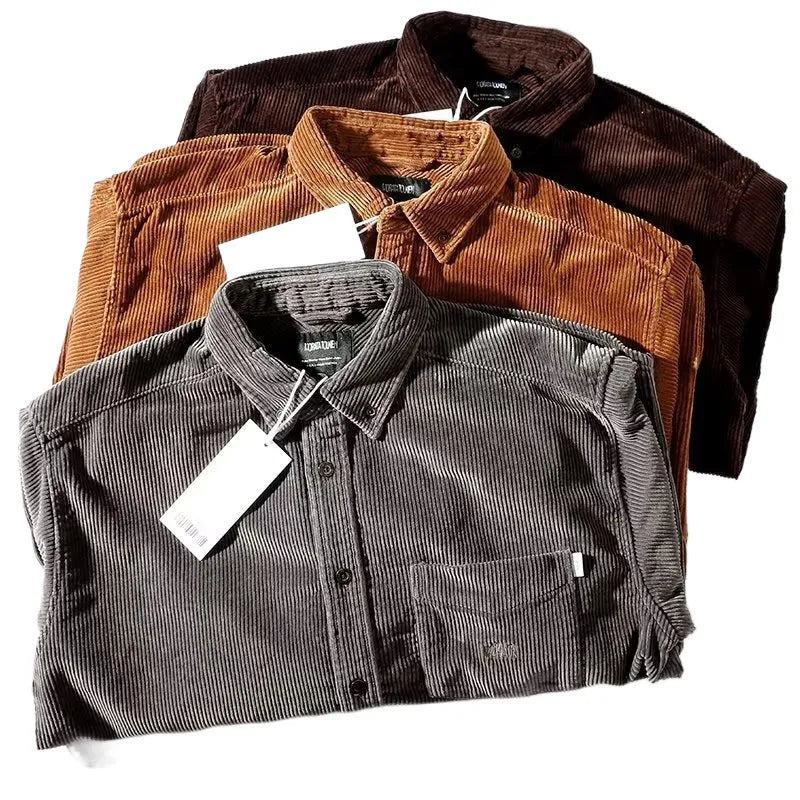 Caramel loose fit corduroy long sleeve shirt with cardigan style on a hanger.