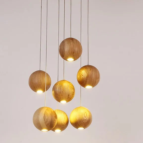 Nordic style wood ball chandelier with adjustable hanging height and solid wood construction