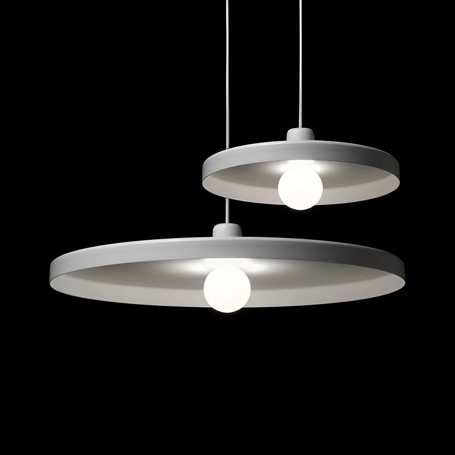 Aluminium alloy pendant chandelier light fitting in black, shown in a restaurant setting.