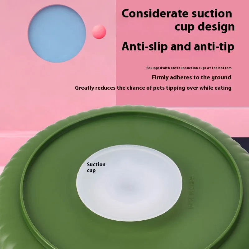 Interactive pet slow feeder bowl with a rotating design and a central, removable silicone licking mat.
