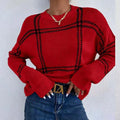 Women's loose-fit plaid colour-block acrylic sweater in apricot, black, beige, red, and green stripes.