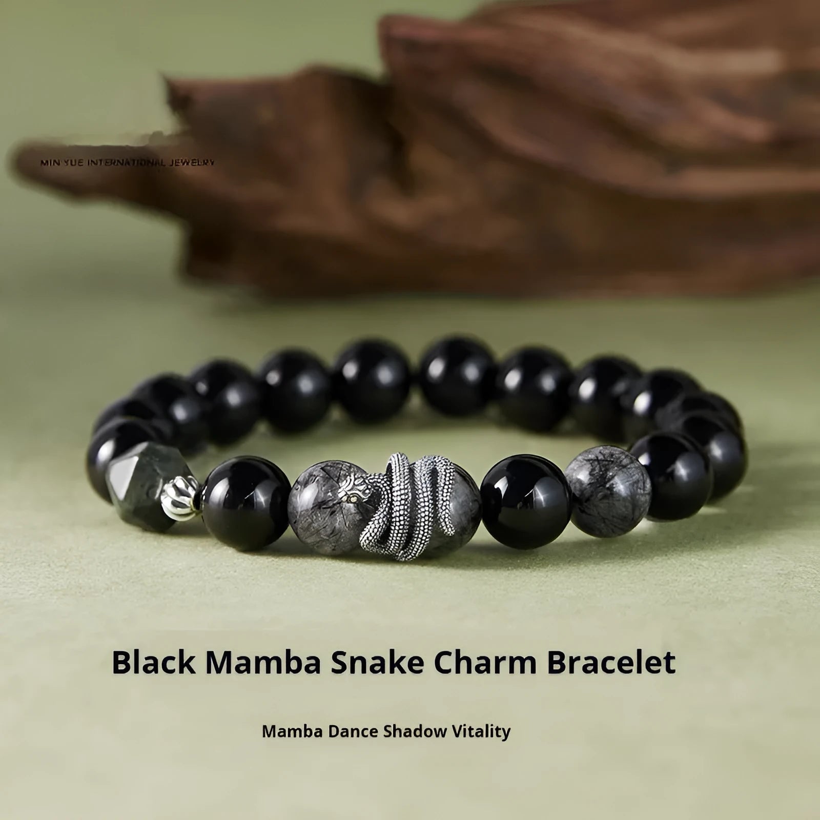 Men's S925 sterling silver bracelet with obsidian black snake motif measuring 10mm wide