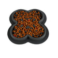 Silicone slow feeder licking pad for cats and dogs on a floor