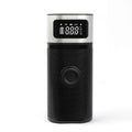 Black portable wireless smart air pump with a 15cm tube and multiple nozzles on a grey background.