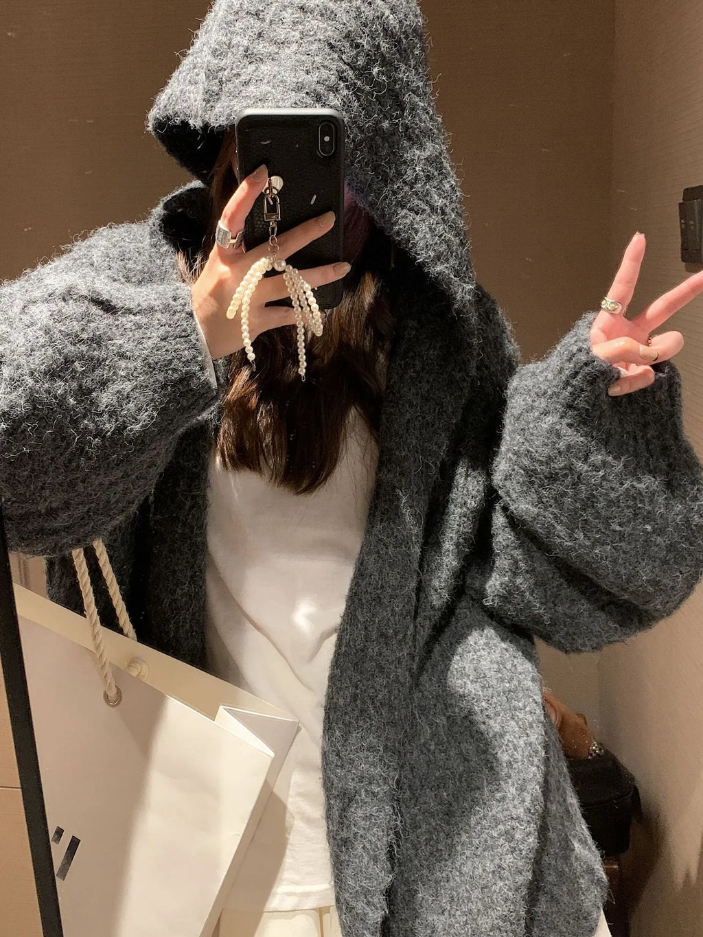 Women's retro Maillard style hooded cardigan sweater in loose fit, shown in dark grey.