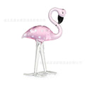 Pink crystal flamingo decorative animal figure on table with modern minimalist style