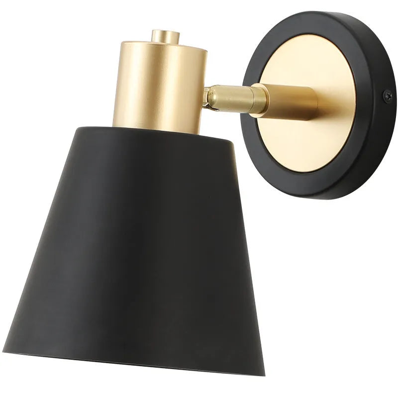 Nordic style iron table lamp with metal shade on a wooden bedside table