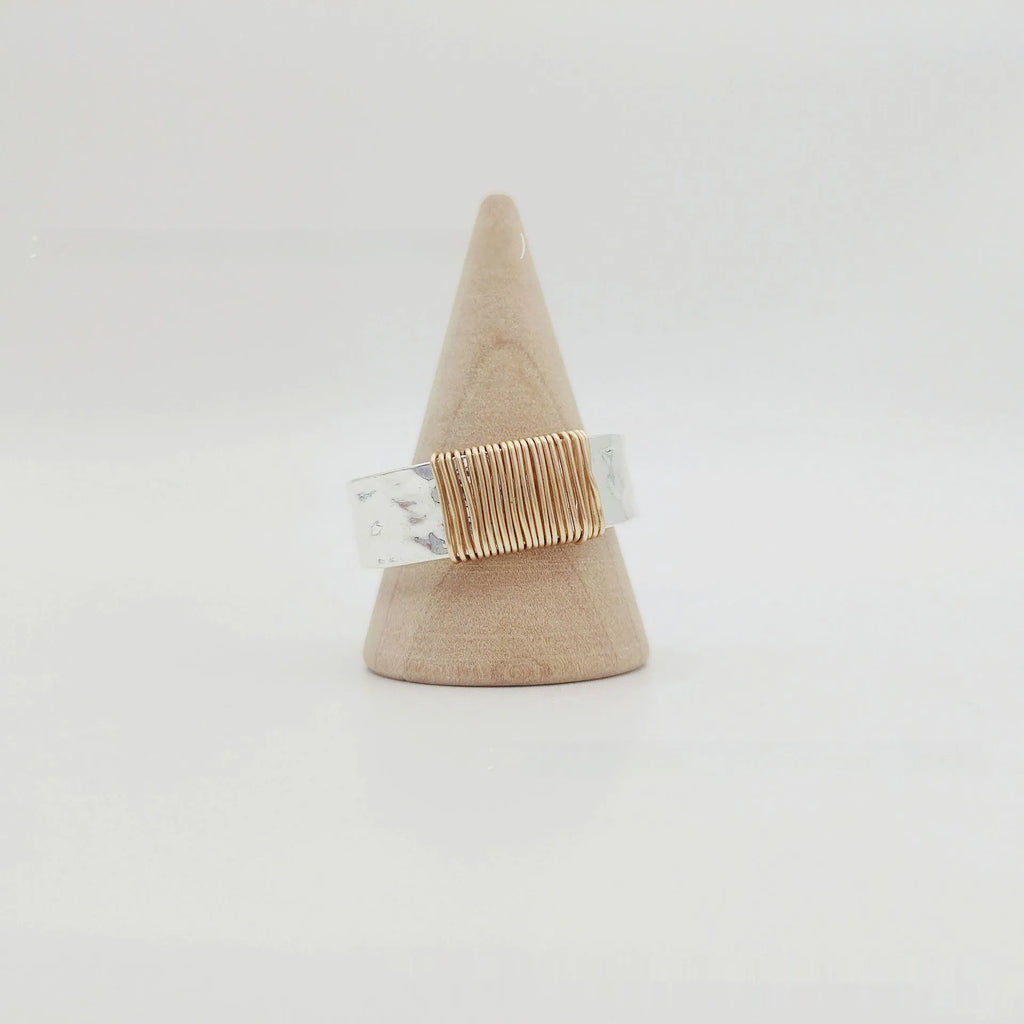 Copper geometric simple bracelet with silver gold coil finish and wide ring design.