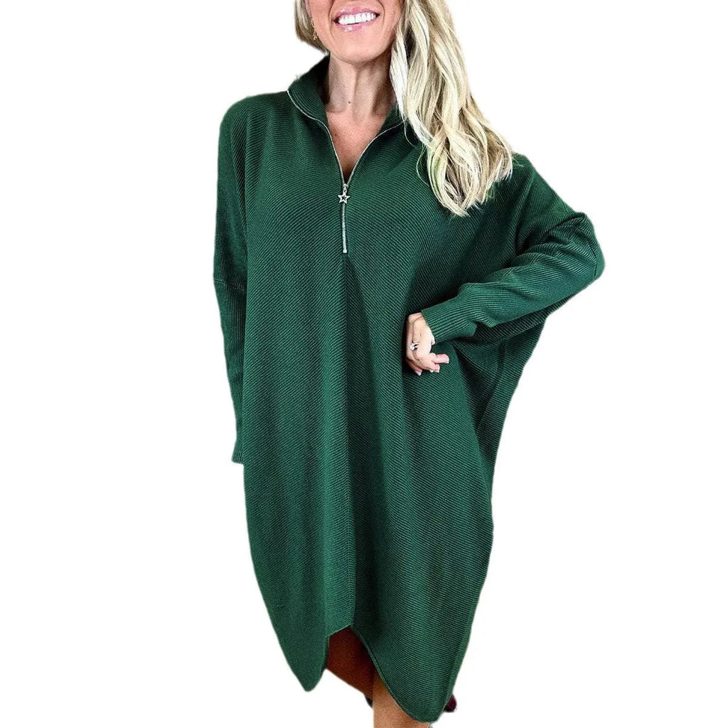 Women's solid colour knitted loose dress with front zip and raglan sleeves.