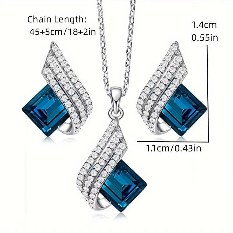 Women's necklace and earring set with glass pendant on cross chain necklace
