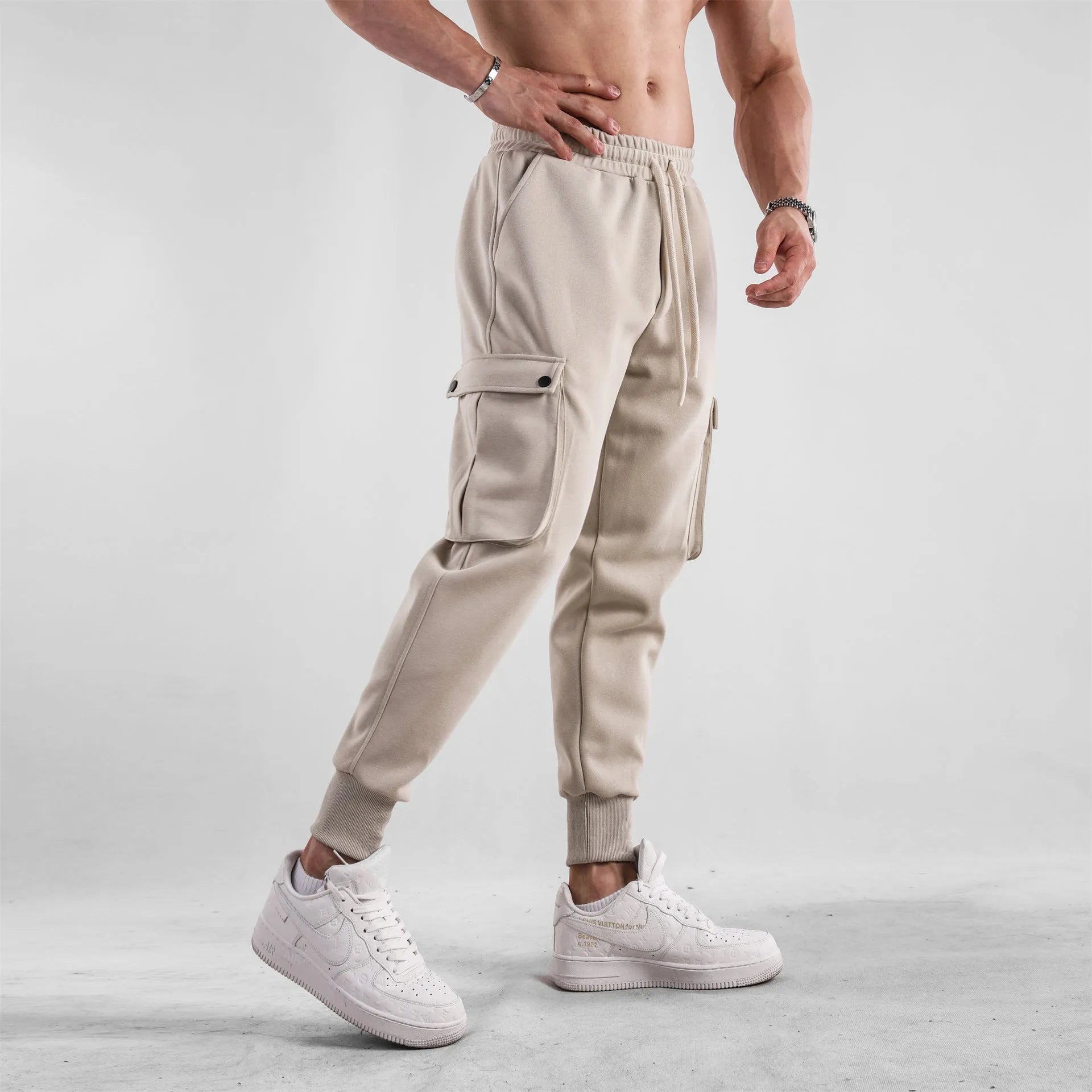 Men's loose cotton sports trousers with multi-pockets and ankle-tied cuffs in six colour options