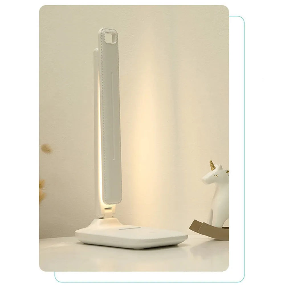 White plastic USB rechargeable bedside lamp with touch dimming controls for children's bedrooms