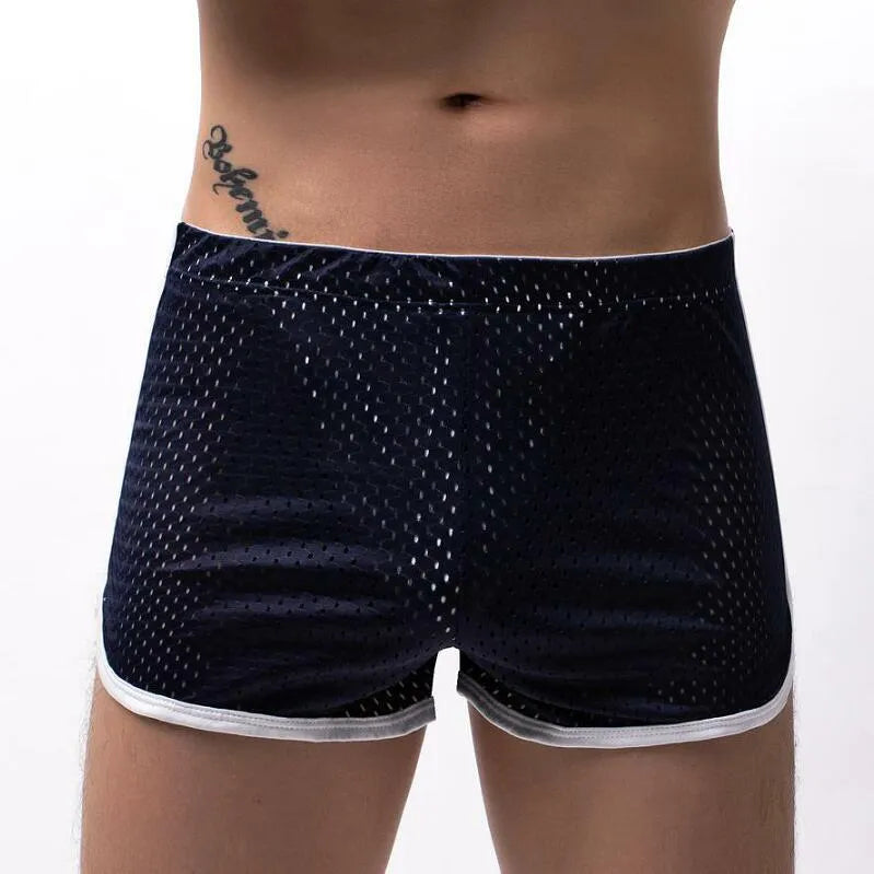 Men's cotton boxer shorts in grey, showing mid waist design and breathable nylon fabric knit.