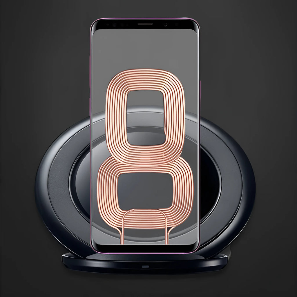 Black Qi wireless charging pad for Samsung Galaxy Note Edge on a wooden surface