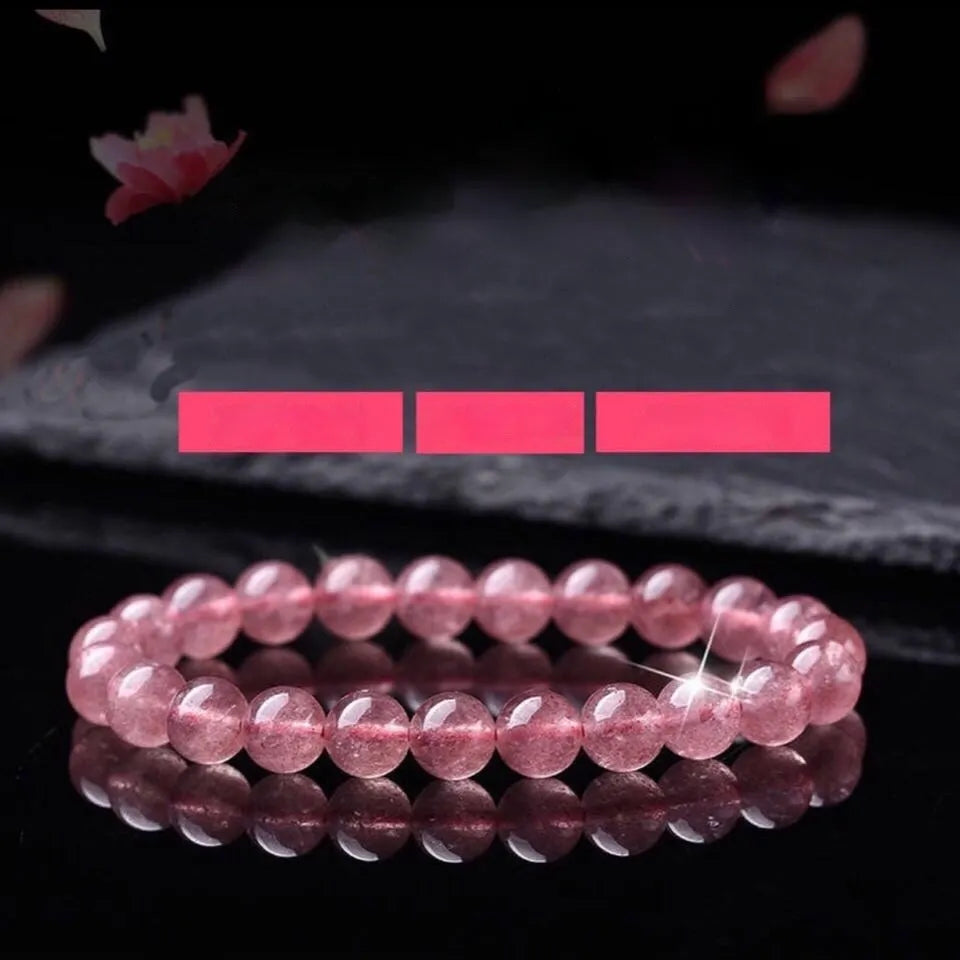 Polished strawberry quartz crystal bracelet for women showing different bead size options