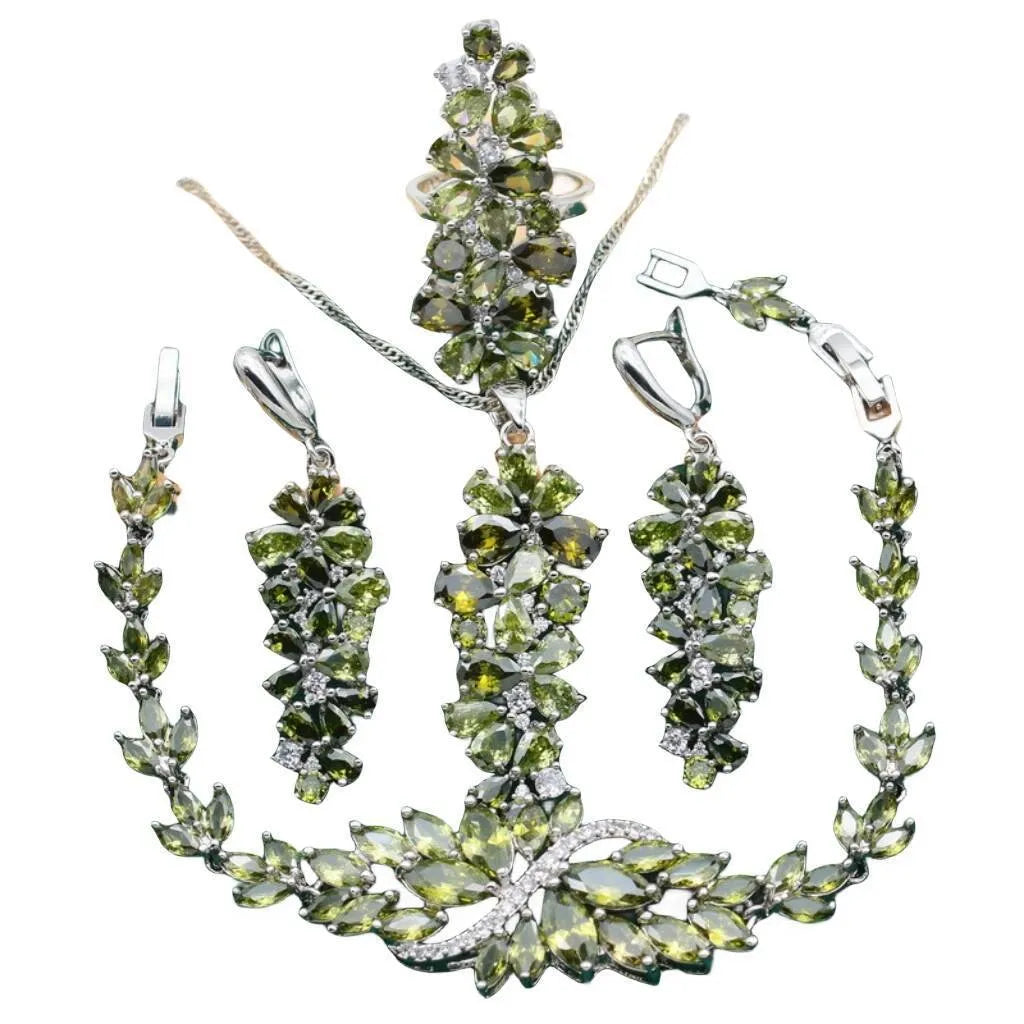 Retro-style jewellery set with necklace, bracelet, earrings, and ring featuring floral patterns in olive and purple colours.