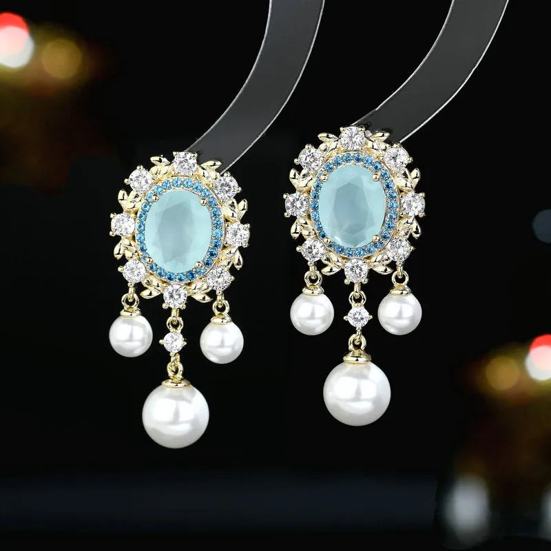 Oval geometric copper earrings with zircon inlay and pearl tassels in light purple colour