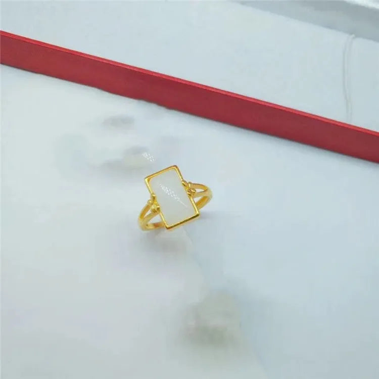 Adjustable brass gold-plated ring with gemstone inlays in black, green, or white colour options