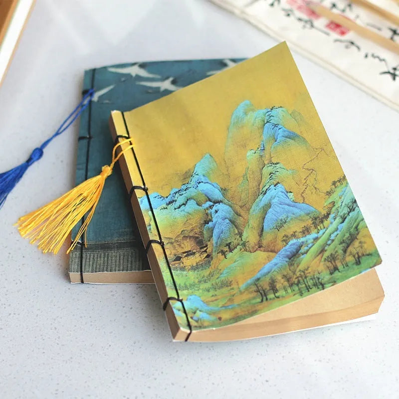 Antique wire-bound notebook with embossed cowhide cover and black wax rope binding