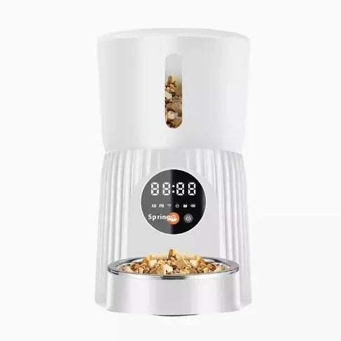 Intelligent automatic pet feeder with timer display and food reservoir in black or white colour options
