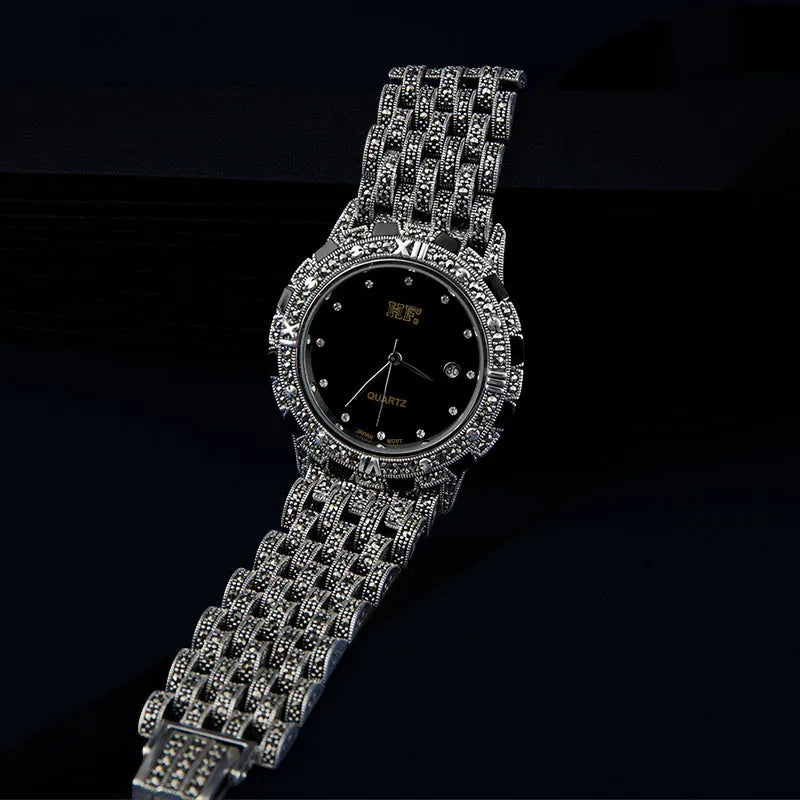 Quartz movement luxury romantic watch with metal strap, round dial, and jewellery buckle in black plate