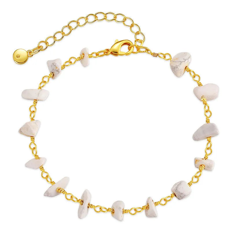Women's irregular gravel texture bracelet with geometric styling and turquoise crystal accents on wrist