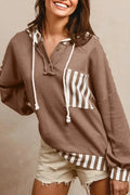 Straw yellow hoodie with waffle texture striped patchwork design featuring drawstring hood and button neck closure