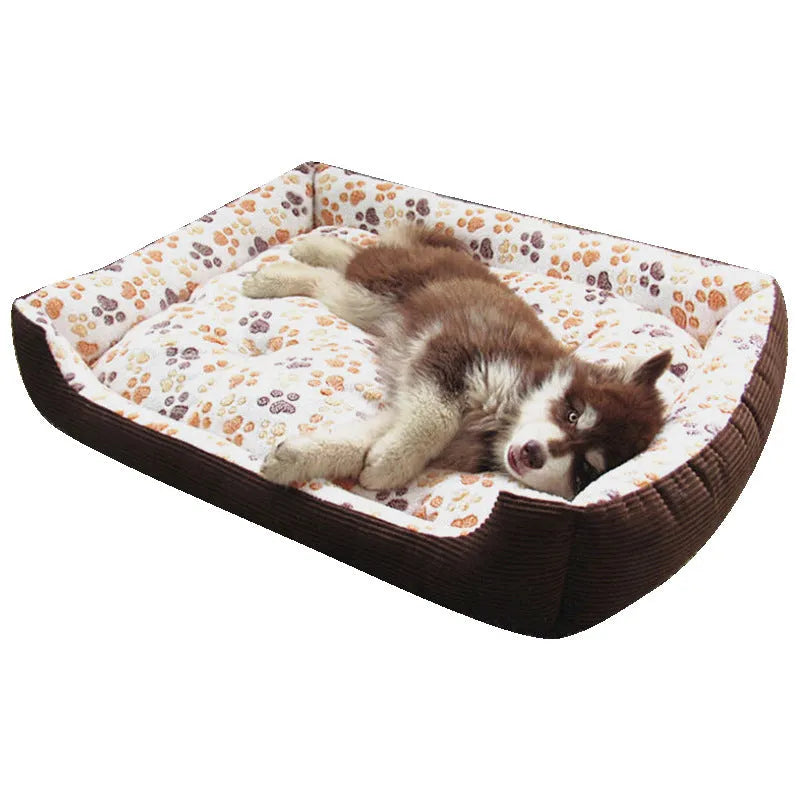 Beige plush bolster dog bed for small dogs on a wooden floor, showing non-slip bottom and raised sides.