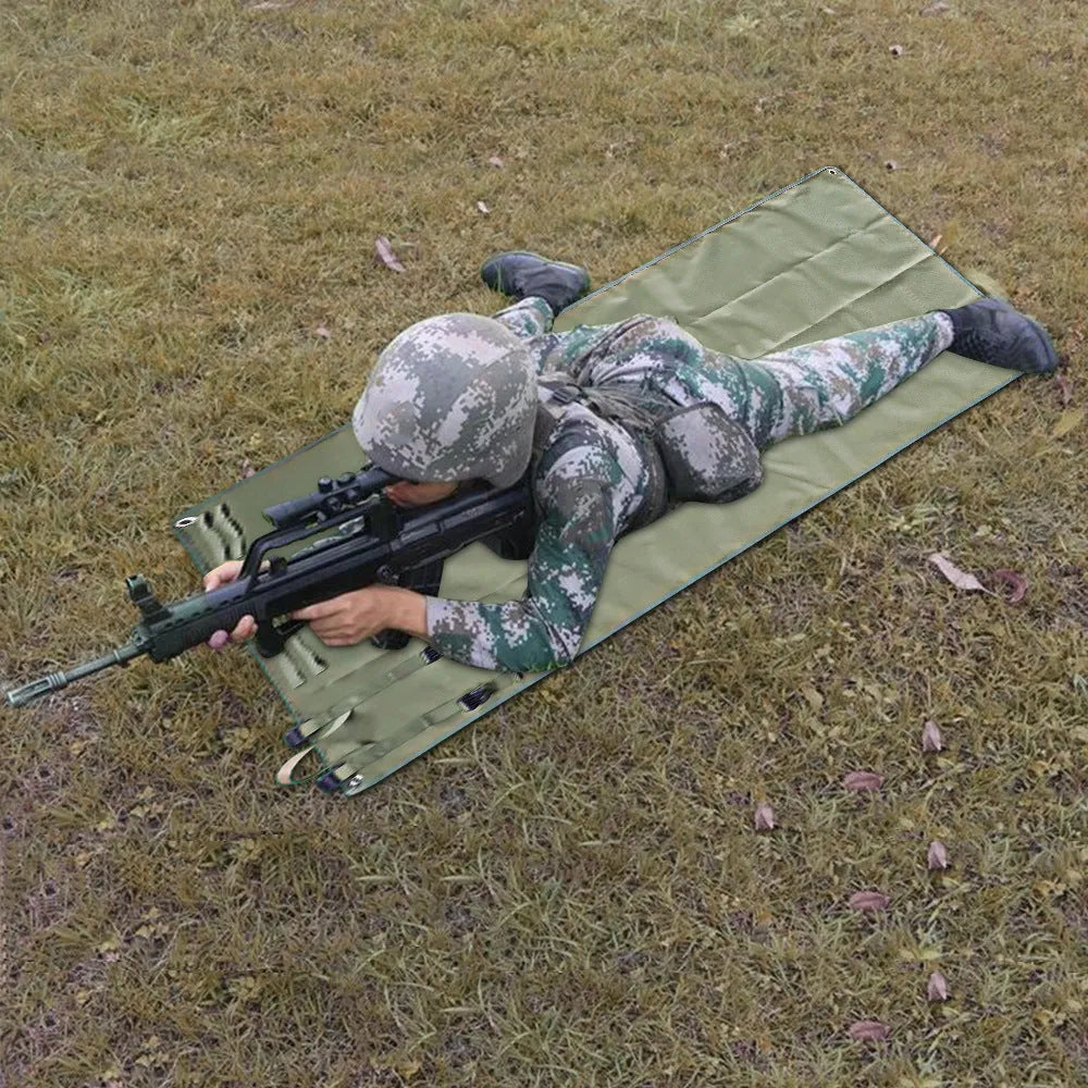 Tactical anti-splashing outdoor camping beach mat in Oxford cloth, 200x75cm, black colour, laid on grass