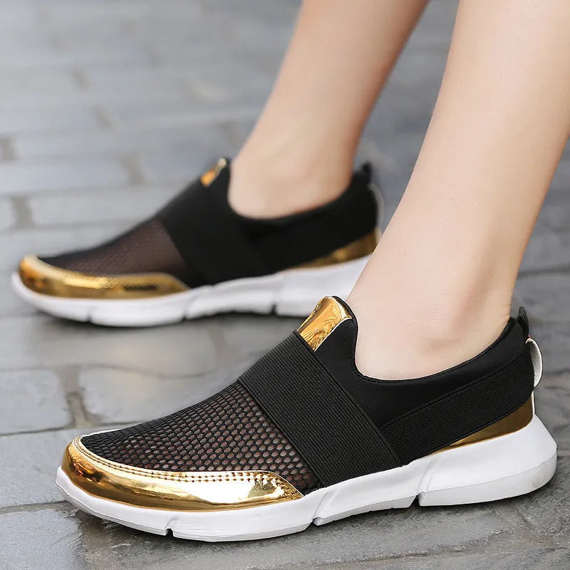 Women's blue mesh summer sneakers with low-top design on hard floor