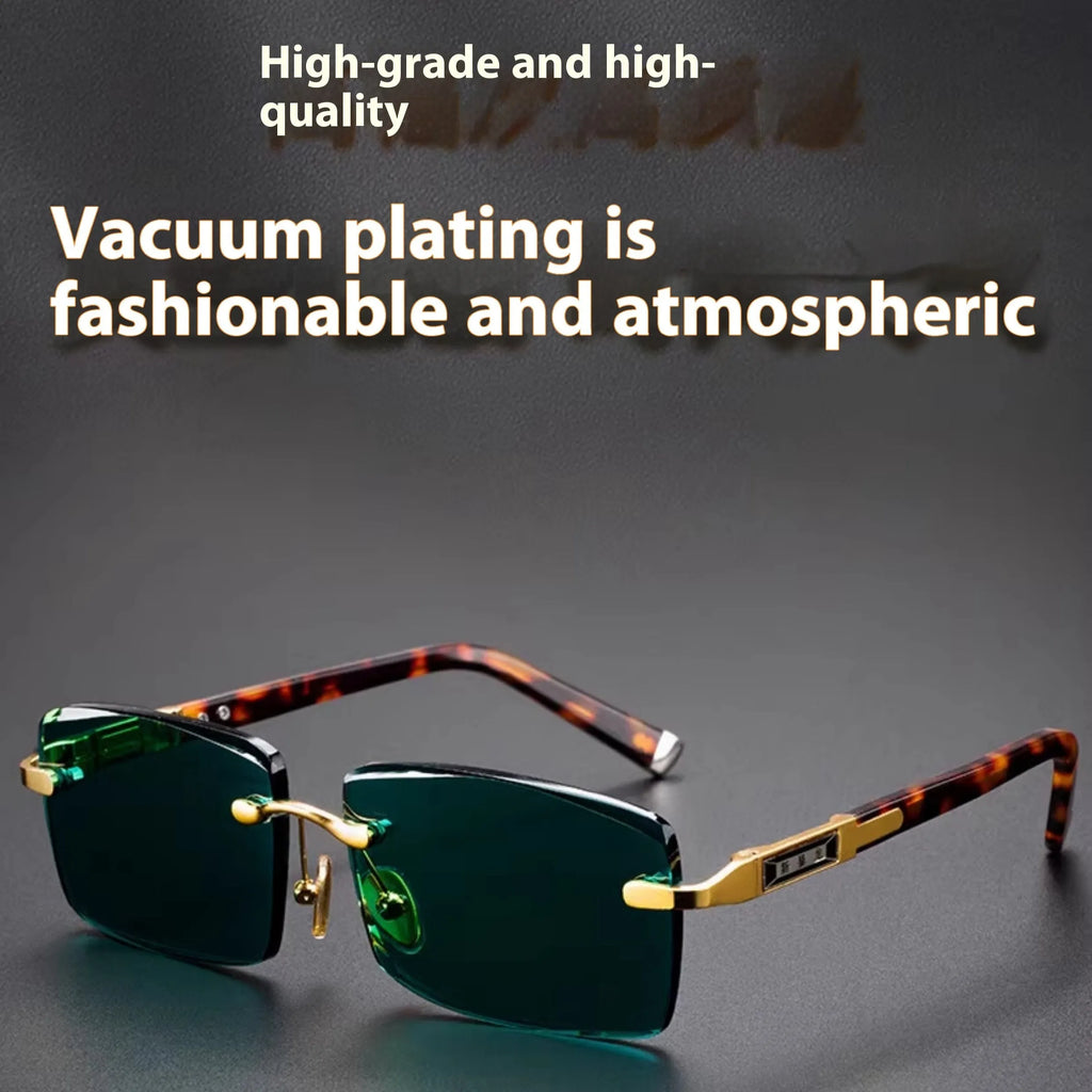 Frameless sunglasses with dark green lenses displayed alongside a protective hard case and cleaning cloth.