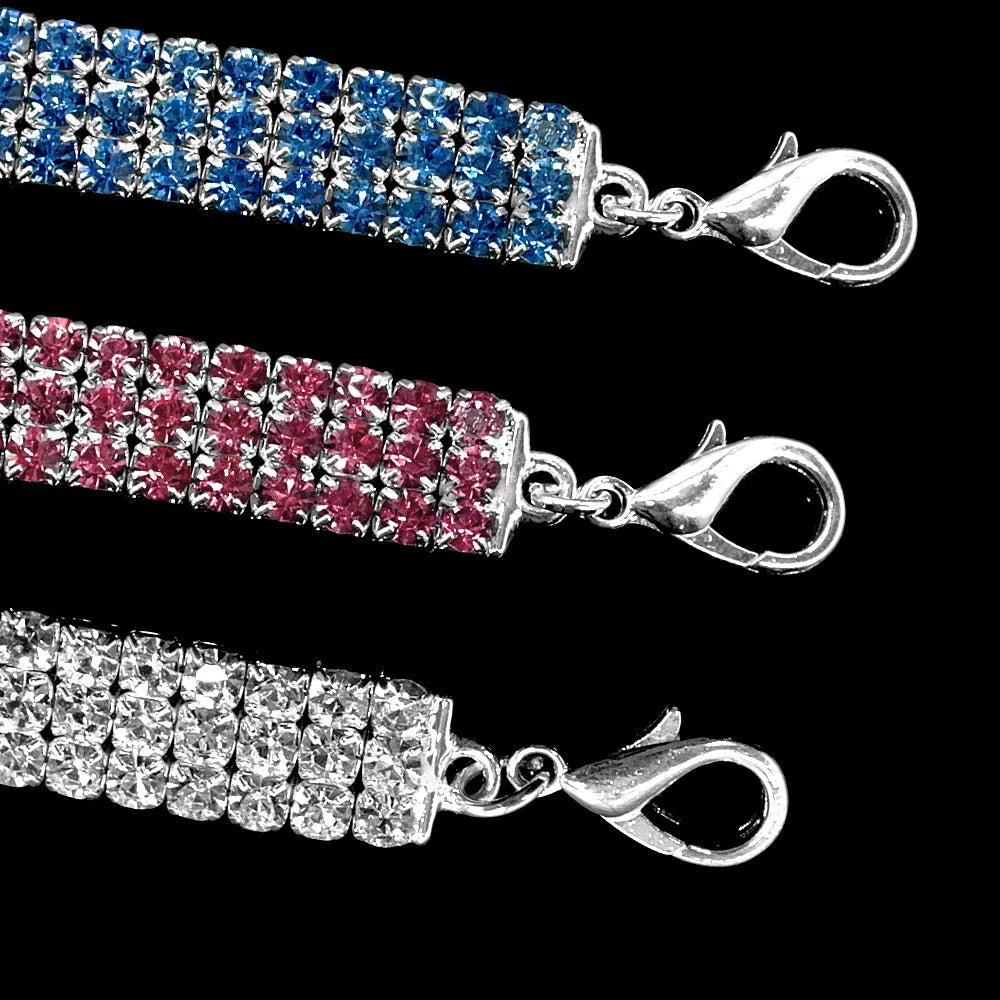Bling rhinestone dog collar with crystal pendant on a small dog, blue colour, adjustable size S