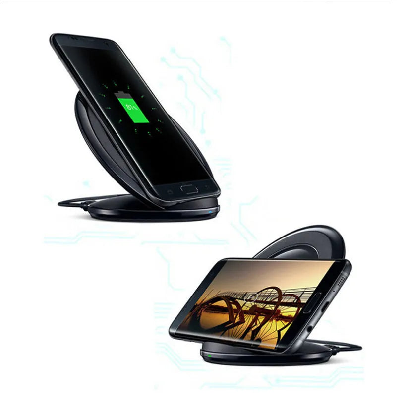 Black Qi wireless charging pad for Samsung Galaxy Note Edge on a wooden surface