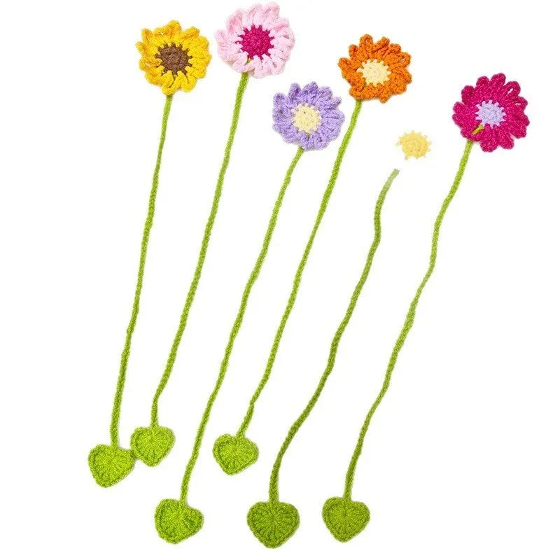 Hand-crocheted wool bookmark with a small daisy design in yellow milk cotton yarn with flexible wire.