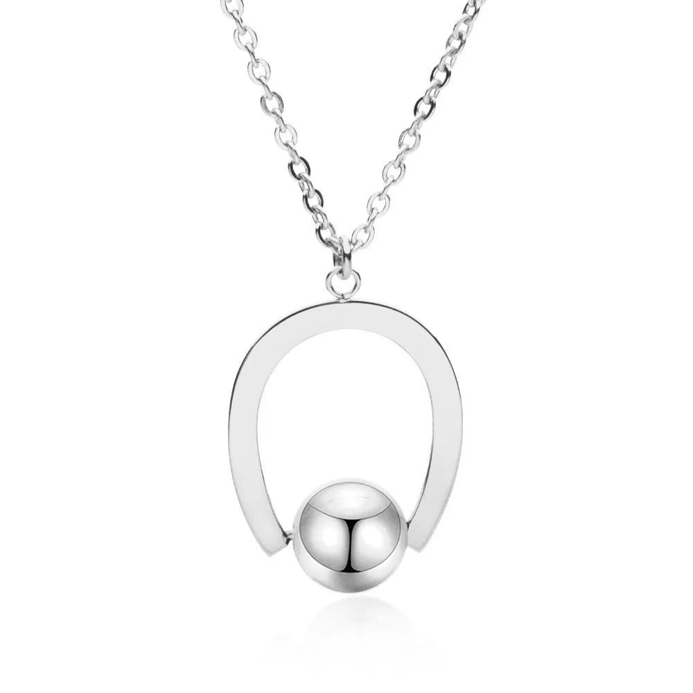 Stainless steel cross chain necklace with geometric pendant in gold or silver electroplated finish