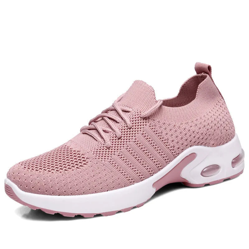 Women's black mesh casual sneaker with round toe, lace-up front, and a light-coloured soft sole.