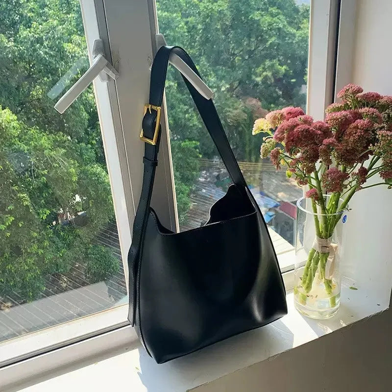Women's black and brown PU shoulder bags with swing thread detail, dimensions 28×32×12cm