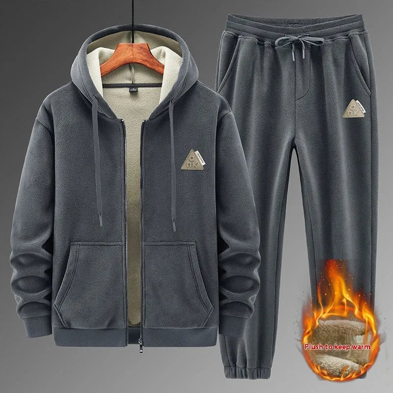 Grey cashmere hooded sweater and cotton pants casual sports suit set laid flat.