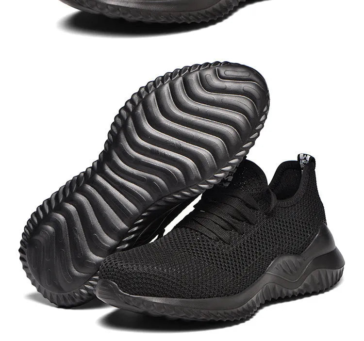 Low-top work safety shoes with steel toe cap and anti-static EVA soles in black colour.