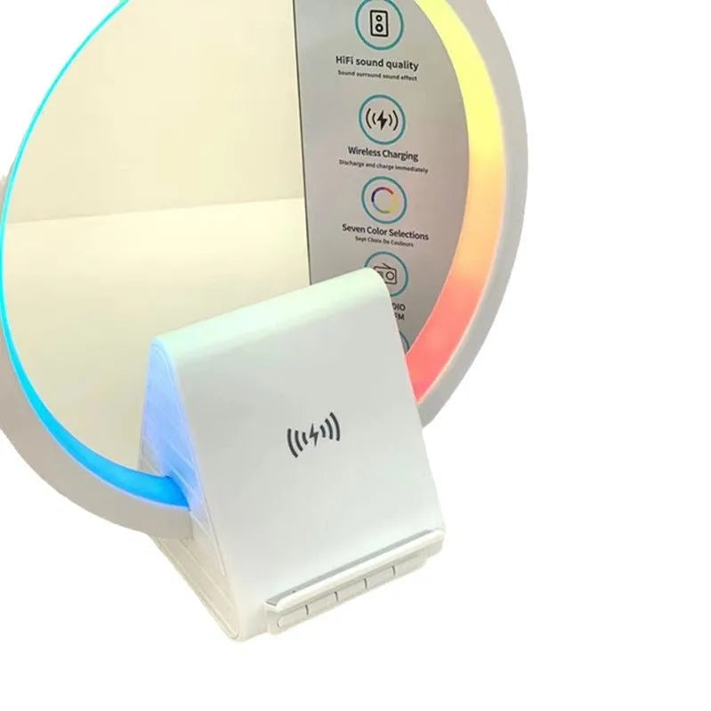 White smart Bluetooth speaker with 15W wireless charging surface and USB port on desktop