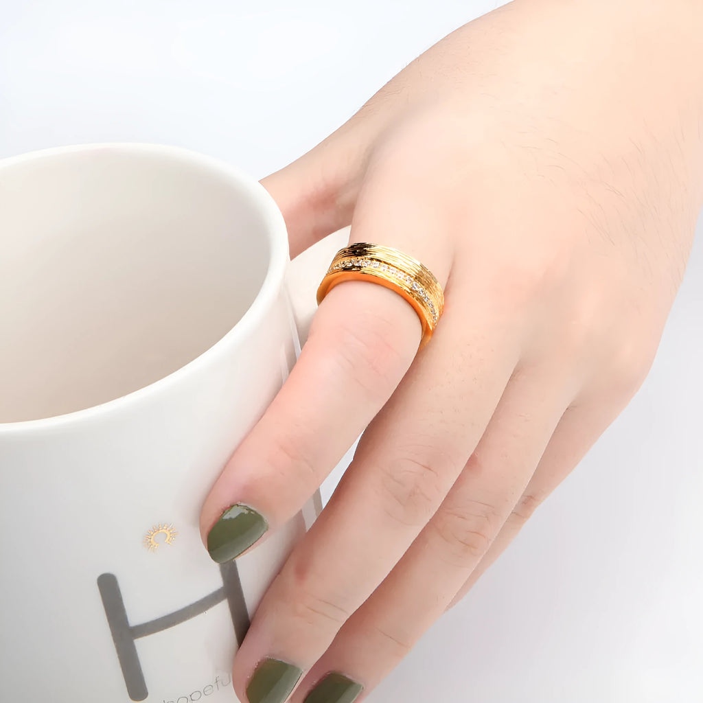 Gold geometric women's copper ring shown in sizes 6, 7, and 8.