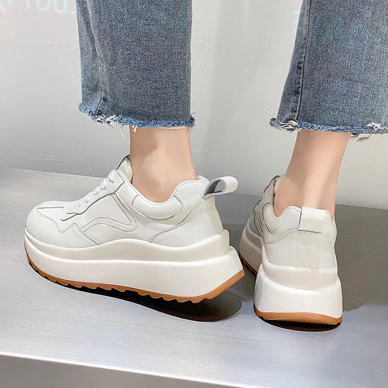 Beige women's low-top leather sports shoes with cross strap and English muffin heel